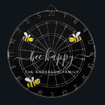Bee happy bumble bees black monogram dart board<br><div class="desc">Decorated with happy,  smiling yellow and black  bumble bees. A black background. White hand lettered script and the text: Bee Happy.  Personalize and add your family name.</div>