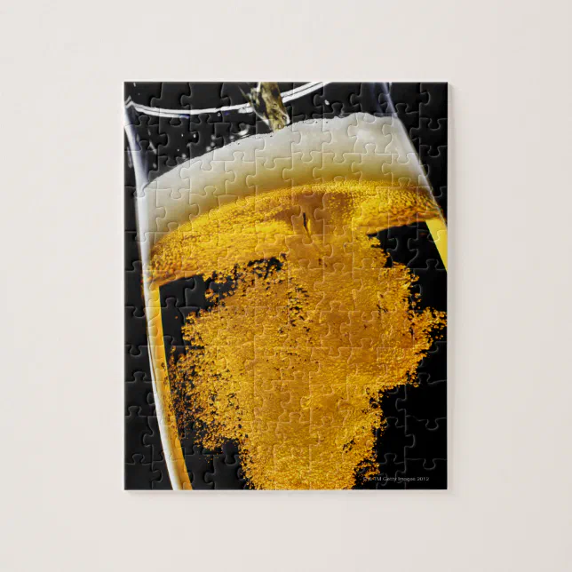 Beer been poured into glass jigsaw puzzle Zazzle