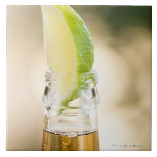 Beer bottle with lime wedge ceramic tile