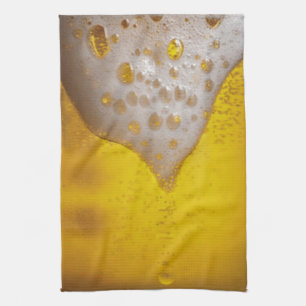 Beer Glass with Bubbles and Foam Towel