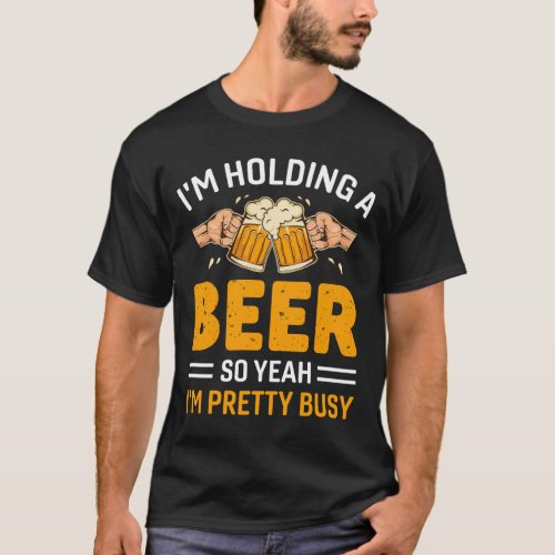 Beer quotes  Holding a beer pretty busy funny T_Shirt