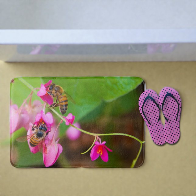 Bees On Coral Vine Flowers Photograph Bathroom Mat (Bees on pink coral vine flowers bath mat. )