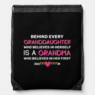 Behind Every Granddaughter Is A Grandma Drawstring Bag