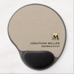 Beige Linen Monogrammed Gel Mouse Pad<br><div class="desc">Add some style to your workspace with this beige linen mouse pad featuring a brushed metallic gold monogram. The gel wrist rest provides comfortable support for extended use. Personalize with your own monogram name title or custom text for a truly unique accessory.</div>