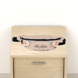 Beige rose gold floral greenery name monogram fanny pack<br><div class="desc">Beige background,  black and golden text. Decorated with watercolored rose gold roses,  eucalyptus greenery and golden sprigs. 
Personalize and add your first name,  monogram initials and full name.</div>