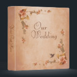 Beige Vintage Lilies Wedding Photo Album Binder<br><div class="desc">Beautiful wedding photo album with vintage floral lilies with a hummingbird. Placed on a soft beige background that has a slight texture effect applied and a darker edge for an old paper look. This design also comes on many other ready to customize template products and can be placed on many...</div>