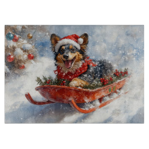 Belgian Shepherd in Sledge Let it Snow Christmas Cutting Board