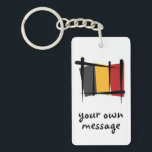 Belgium Brush Flag Keychain<br><div class="desc">Represent Belgium! This item features a brush stroke sketch of the Belgian flag that simulates Sume-e brush painting. Do you know a Belgian or Belgian-American who misses their home country and culture and would like to be patriotic about their nation? Travellers to Europe, Belgian-Americans, or Belgians themselves will love to...</div>
