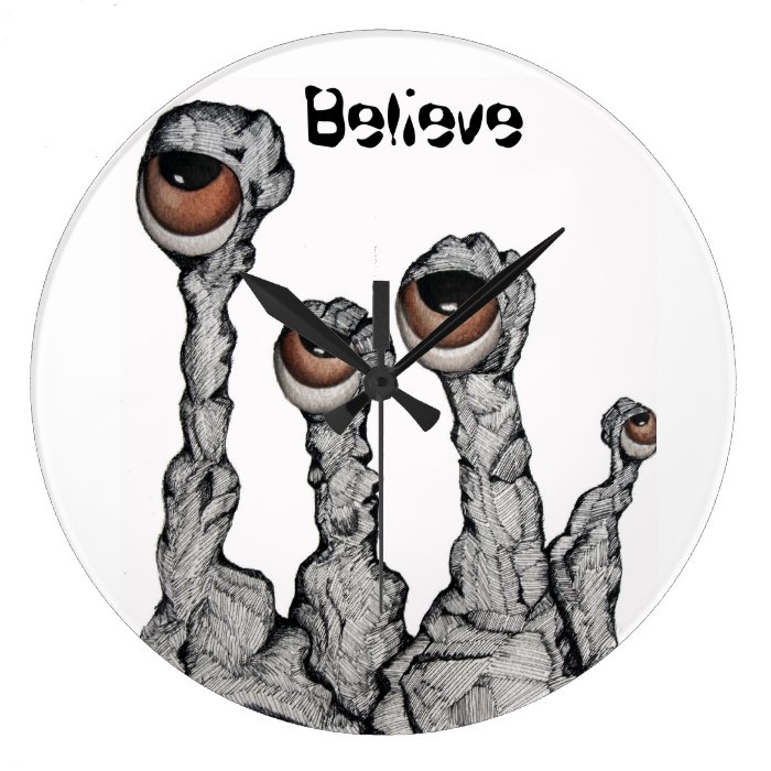 Believe Alien Rocks Wall Clock