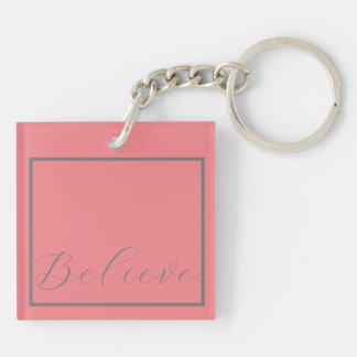 'Believe' Gray Script Pink Background Keychain