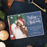 Believe in Christmas magic 2 family photos blue Holiday Card<br><div class="desc">Modern holiday greeting card featuring one of your favorite Christmas family portraits on the left complemented by the words "Believe in the magic of Christmas" on the right over a festive blue background, customizable with your own greeting message. You can upload one more picture on the reverse of the card....</div>