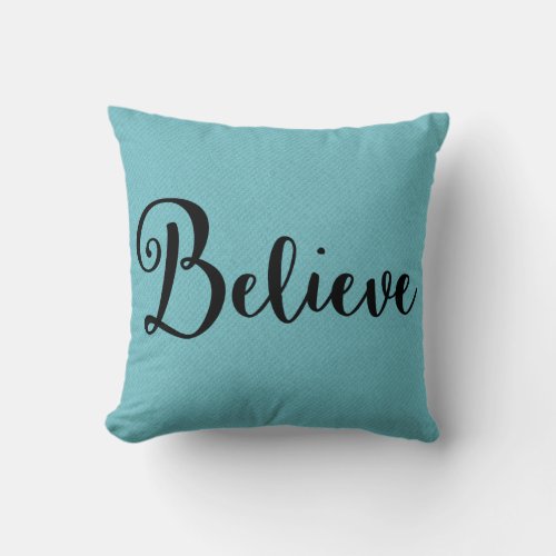 Believe Text in Black on Blue Pillow