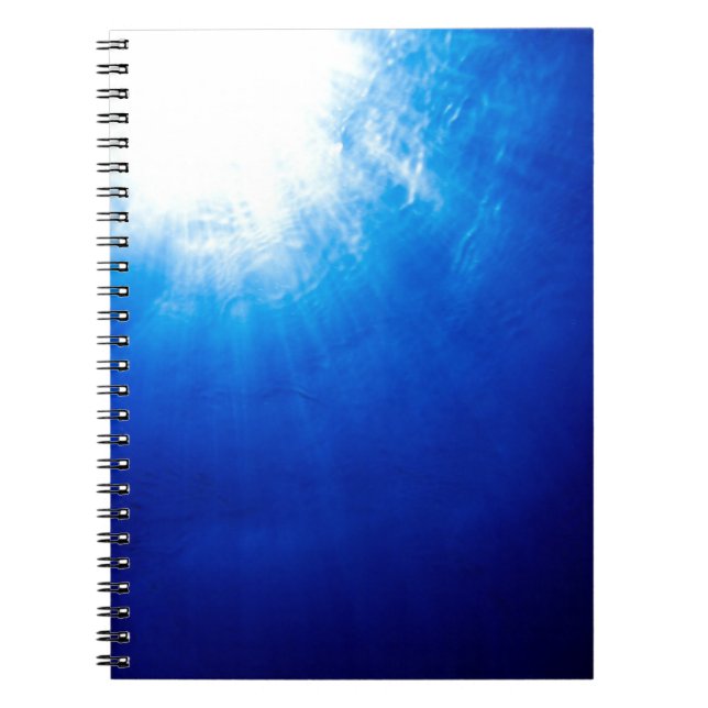 Below beneath blue deep dive notebook (Front)
