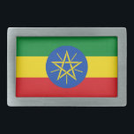 Belt Buckle with Flag of Ethiopia<br><div class="desc">This eye-catching belt buckle featuring the Flag of Ethiopia is a bold statement piece that adds a patriotic touch to any outfit. Showcasing the vibrant green, yellow, and red colors with the iconic emblem at the center, this belt buckle is perfect for those who take pride in Ethiopia’s rich history...</div>