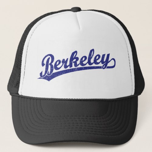 Berkeley script logo in blue trucker hat