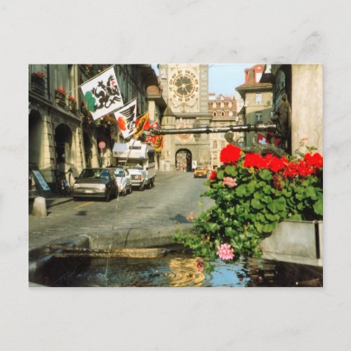 Berne Main streetclocktower and geraniums Postcard