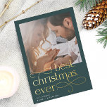 Best Christmas Ever Engagement Photo Foil Holiday Card<br><div class="desc">Share the news of your holiday season engagement with these elegant and festive engagement announcement cards featuring a square photo with "best Christmas ever" overlaid in gold foil lettering. Personalize with your announcement (shown with "we're engaged") and names beneath,  and add additional details to the back.</div>