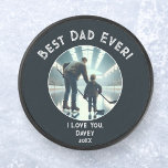 Best Dad Ever! Love You Full Photo Father's Day Hockey Puck<br><div class="desc">A fusion of modern design and heartfelt sentiment, this personalized hockey puck stands as a tribute to fatherhood's finest. This sleek white text typography, infused with trendsetting style, elegantly overlays a cherished photo, capturing a moment frozen in time. With your names and the year inscribed, this custom creation becomes a...</div>