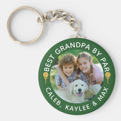 BEST GRANDPA BY PAR Photo Golfer Green Keychain - Create a custom personalized photo keychain for a golfer grandfather with the editable funny title BEST GRANDPA BY PAR and name(s) or other custom text shown in white text against an editable green background color you can change to a complementary color to your picture or his favorite color. Memorable keepsake gift for Grandparents Day, Fathers Day or his birthday. ASSISTANCE:  For help with design modification or personalization, color change or transferring the design to another product, contact the designer BEFORE ORDERING via the Zazzle Chat MESSAGE tab below or email makeitaboutyoustore@gmail.com.