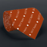 Best Man Repeating White Text on Rust Orange Neck Tie<br><div class="desc">This fun neck tie is the perfect accessory for the best man at your wedding. It features a simple yet elegant design with the words "Best Man" written in fancy all capital white text repeating in a diagonal pattern on a rust orange or burnt umber colored background. There are diamonds...</div>