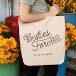 Besties Modern Script Gold Heart Custom Names Tote Bag<br><div class="desc">This modern tote bag with a minimalist casual chic script calligraphy design reading Besties Forever as well as your custom names features clean lines to create a sleek and sophisticated appearance. The understated style with the little printed gold heart detail adds a touch of sophistication to this perfect gift for...</div>