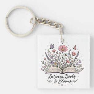 Between books and blooms book lover reader keychain