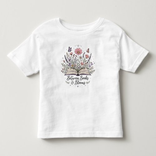 Between books and blooms book lover reader toddler t-shirt