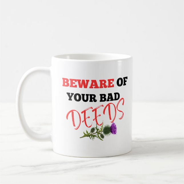 BEWARE OF YOUR BAD DEEDS  COFFEE MUG (Left)
