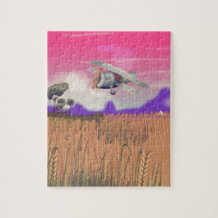 Bi-Plane Flying over crops under setting sun Jigsaw Puzzle