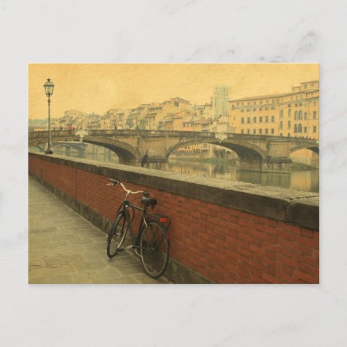 bicycle on background Old bridge in Florence Postcard