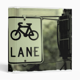 Bicycle sign in the city binder
