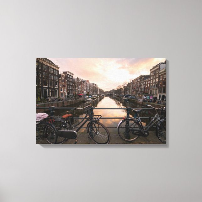 Bicycles at sunset in Amsterdam Canvas Print (Front)
