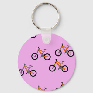 Bicycles pattern on pink keychain