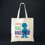Big Brother Personalized Superhero Silhouette Boys Tote Bag<br><div class="desc">Big Brother Personalized Superhero Silhouette Boys Tote Bag. Edit to change font colors or sizes. Orange, green, blue and red font spells out "I am the big brother" with name underneath. A cute superhero boy silhouette in shades of blue with cape and boots. Coordinate with a little brother or sister...</div>