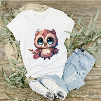 Big Eyed Blue Eyed Owl Holding A Rose Graphic  T-shirt by PaintedDreamsDesigns at Zazzle