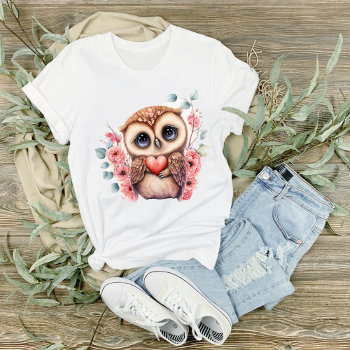 Big Eyed Owl Holding A Heart Graphic  T-shirt by PaintedDreamsDesigns at Zazzle