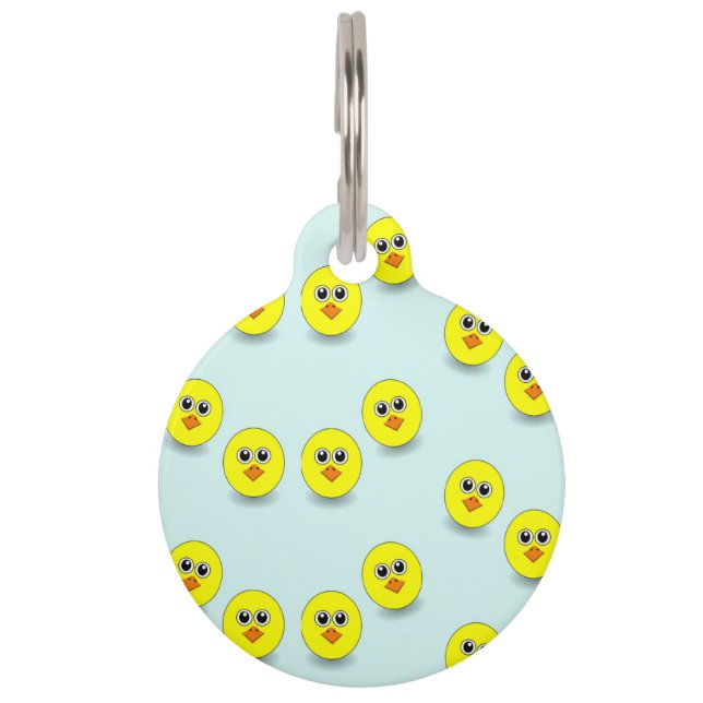 Big head chick on blue pet ID tag (Front)