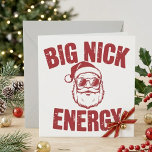 Big Nick Energy Funny Santa Christmas Quote Holiday Card<br><div class="desc">This playful Christmas design features the phrase Big Nick Energy in bold distressed red lettering with a cool Santa illustration wearing sunglasses. The simple layout gives the joke strong visual impact while keeping the holiday theme clear and easy to read. It blends festive humor with a confident, cheeky style that...</div>
