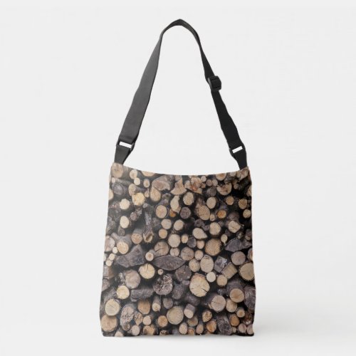 Big pile of cut logs stacked on top of each other crossbody bag