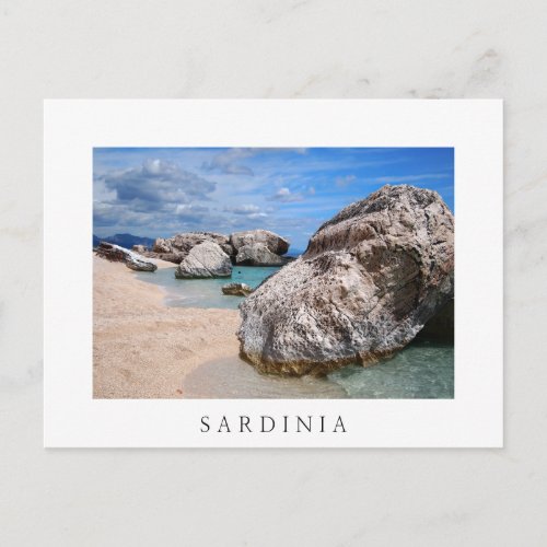 Big rocks on Sardinia beach white text postcard