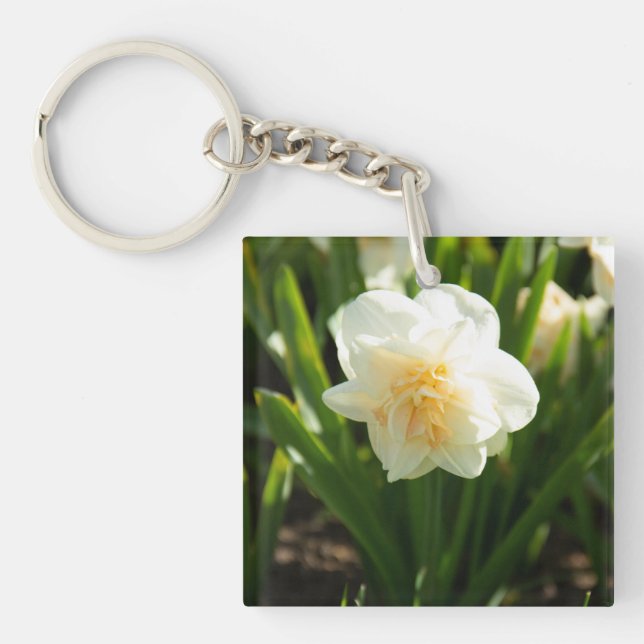 Big white daffodils on a spring day keychain (Front)