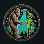 Bigfoot Alien Alliance - Funny Scifi Cryptid Dart Board<br><div class="desc">Step into a world where the extraordinary meets the unexplained with this captivating design. At its heart, a legendary Bigfoot extends a friendly hand to an alien, both bathed in the ethereal glow of a UFO’s beam. Set against a backdrop of a serene pine forest under a star-studded night sky,...</div>