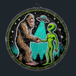 Bigfoot Alien Alliance - Funny Scifi Cryptid Dart Board<br><div class="desc">Step into a world where the extraordinary meets the unexplained with this captivating design. At its heart, a legendary Bigfoot extends a friendly hand to an alien, both bathed in the ethereal glow of a UFO’s beam. Set against a backdrop of a serene pine forest under a star-studded night sky,...</div>