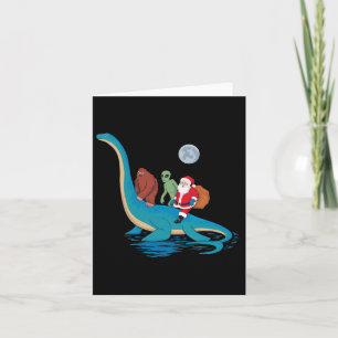 Bigfoot Alien Santa Claus Riding Dinosaur Christma Card