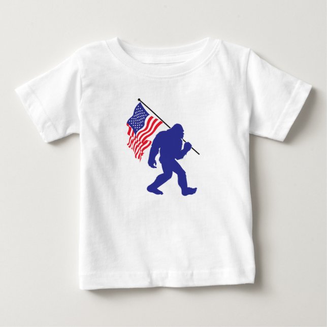 Bigfoot Carrying an American Flag Baby T-Shirt (Front)