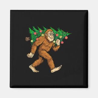 Bigfoot Carrying Christmas Tree Sasquatch Believer Magnet