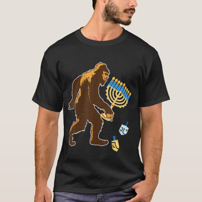 Bigfoot Carrying Hanukkah Menorah Sasquatch Believ T-Shirt (Front)