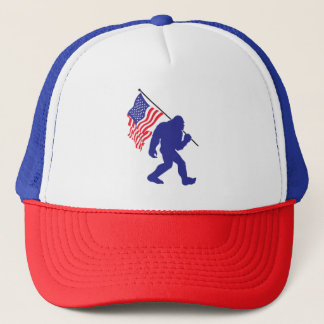Bigfoot Carrying the American Flag Trucker Hat