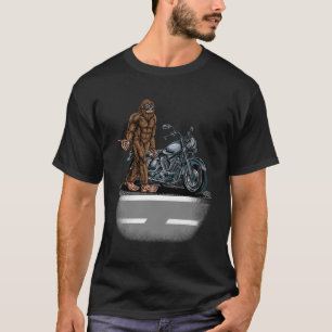 Bigfoot Riding A Motorcycle Bike Trying To Hitch A T-Shirt
