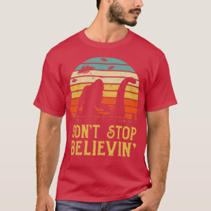 Bigfoot riding Loch Ness Monster dont stop believi T-Shirt